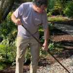 Tim Kent raking gravel